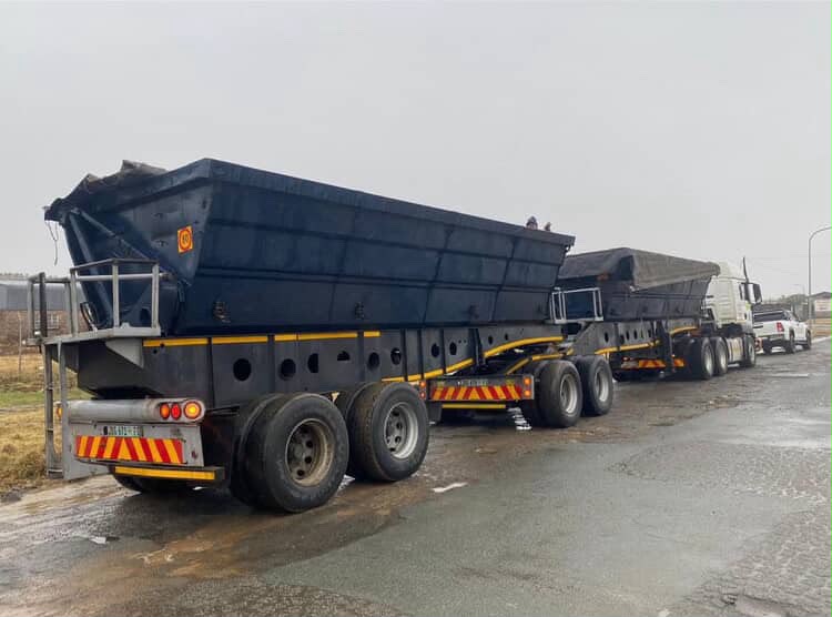 Side tipper trailers in transit on the road