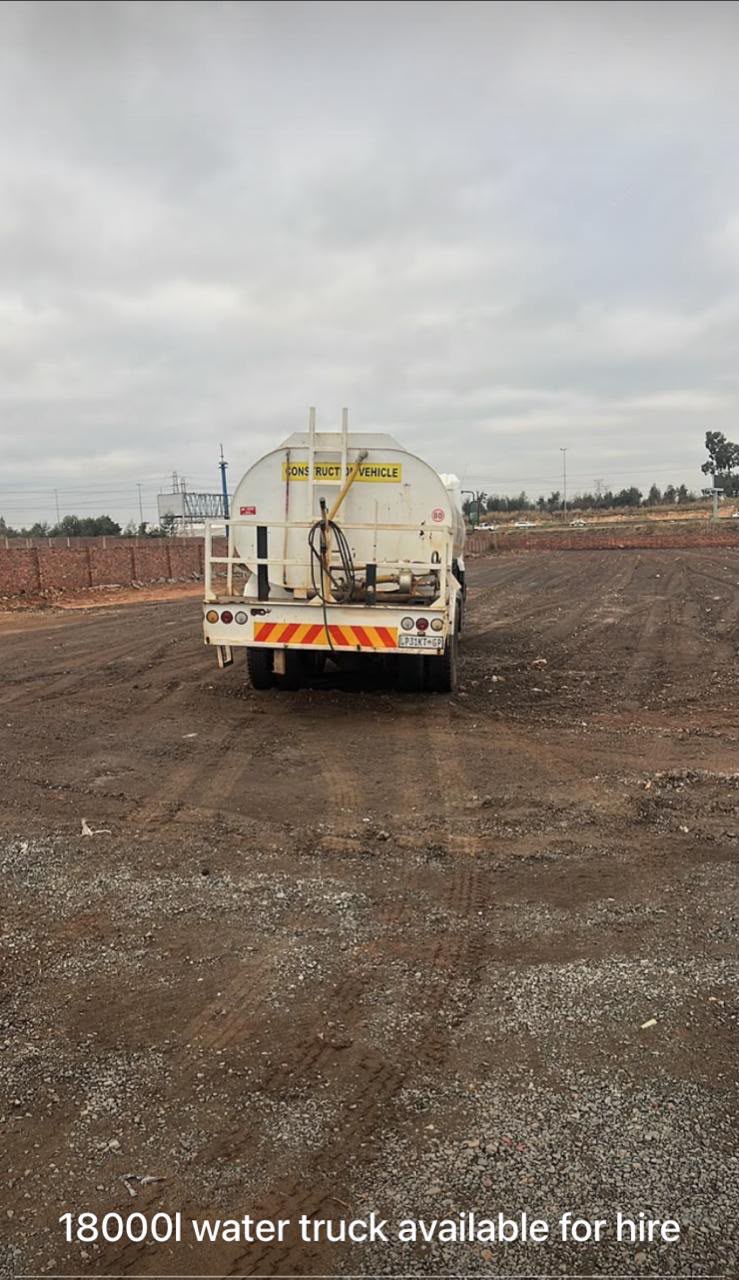 Water truck operating on a construction site