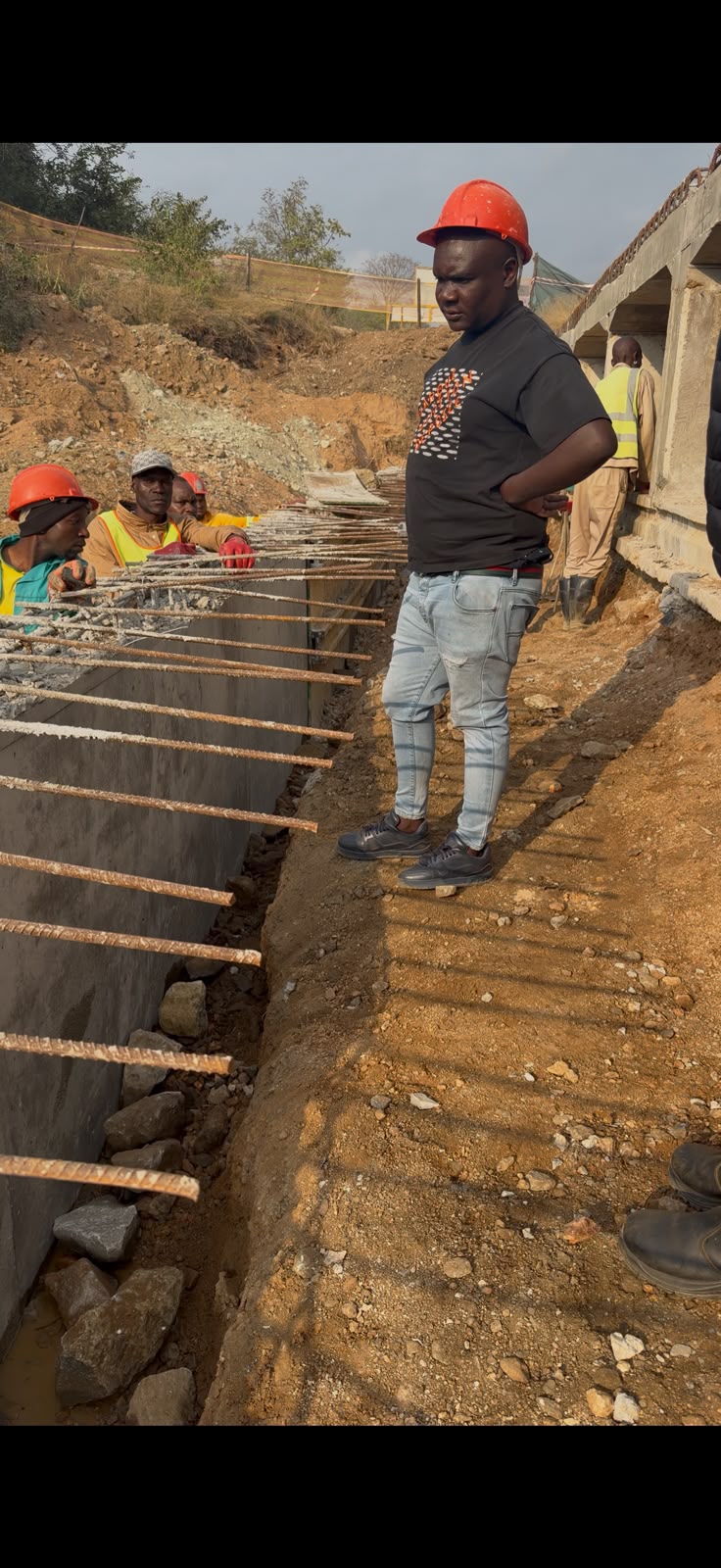 Che Lele crew on a construction site