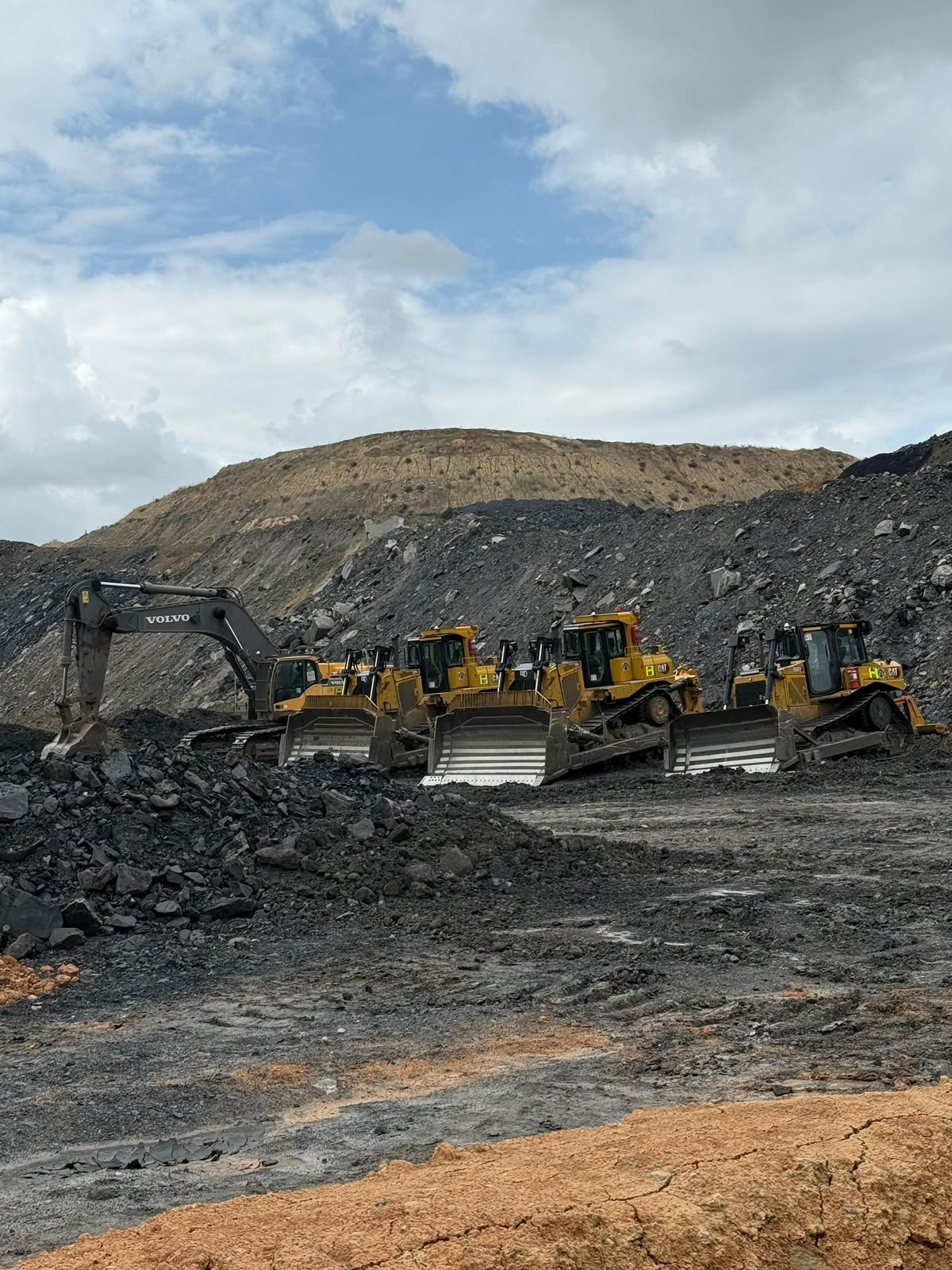 Che Lele mining operation with excavators and bulldozers