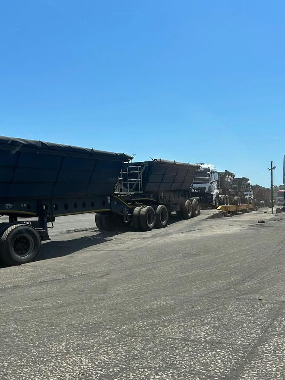 Side tipper interlink trucks queued at the loading plant